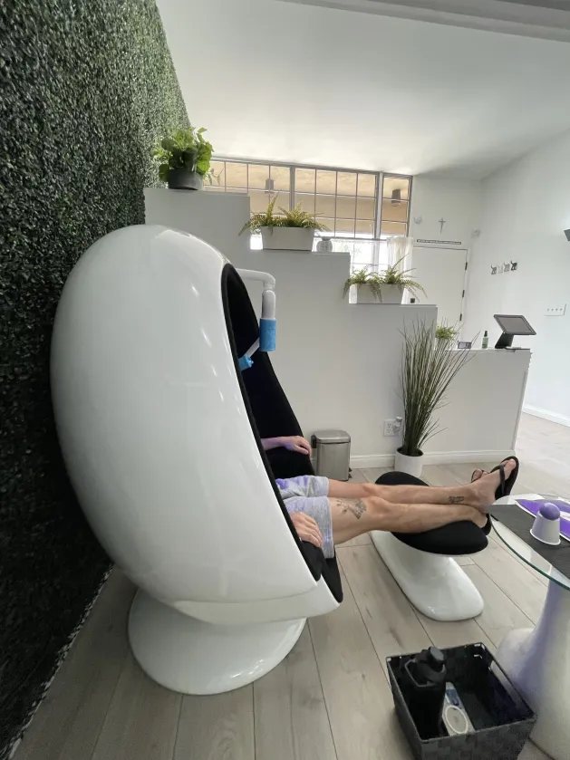 A client relaxing during her whitening session